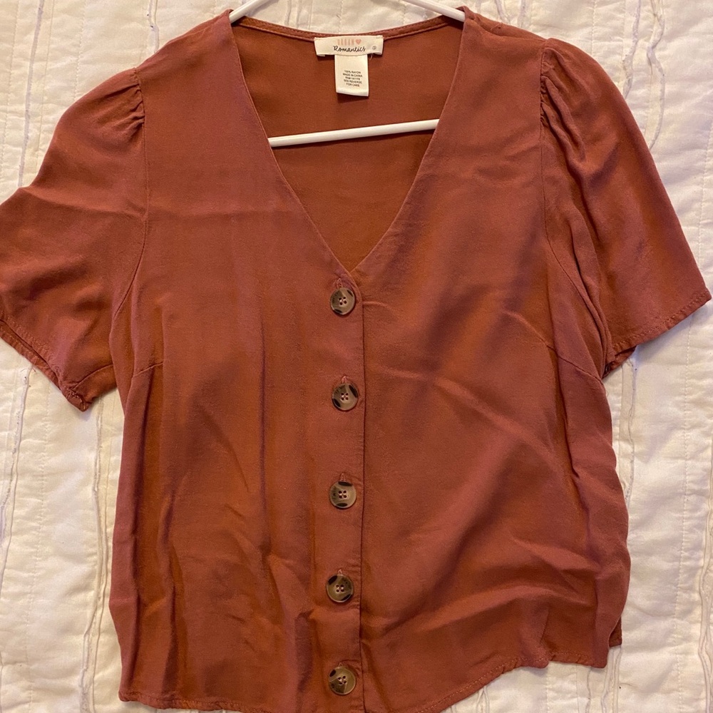 Salmon button up top